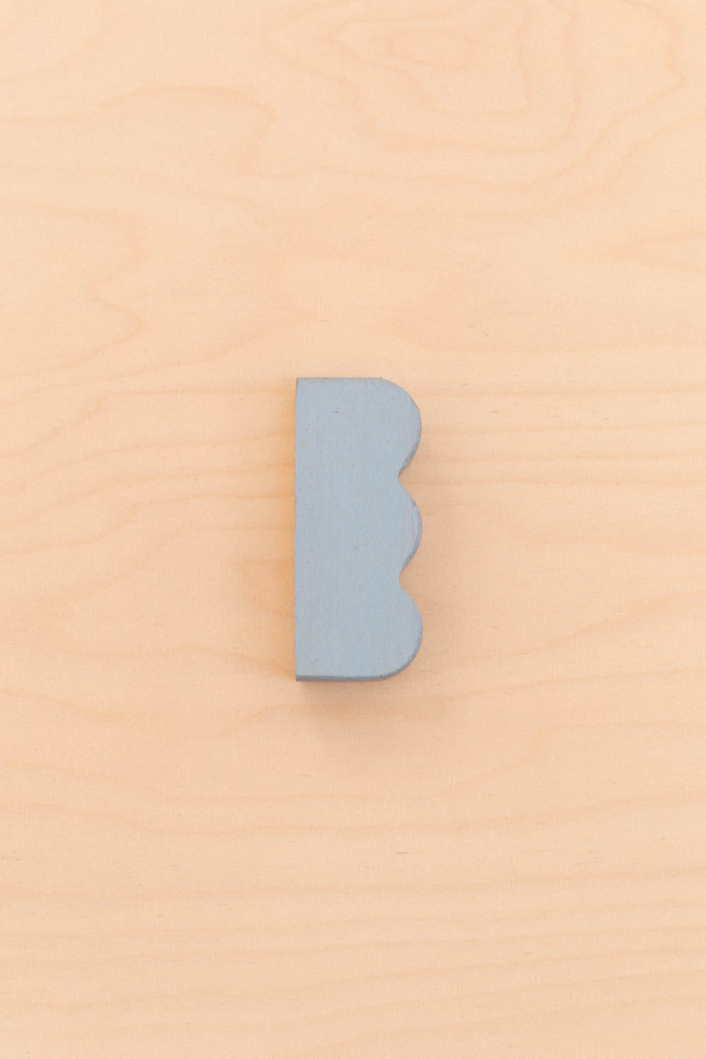 Bouton de meuble ondulé coloré