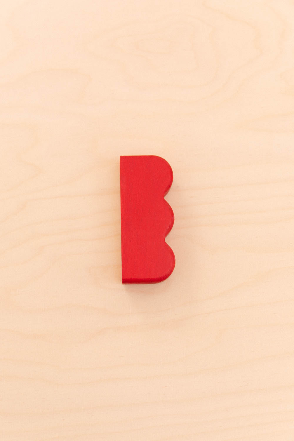 Bouton de meuble ondulations sur le côté en chêne