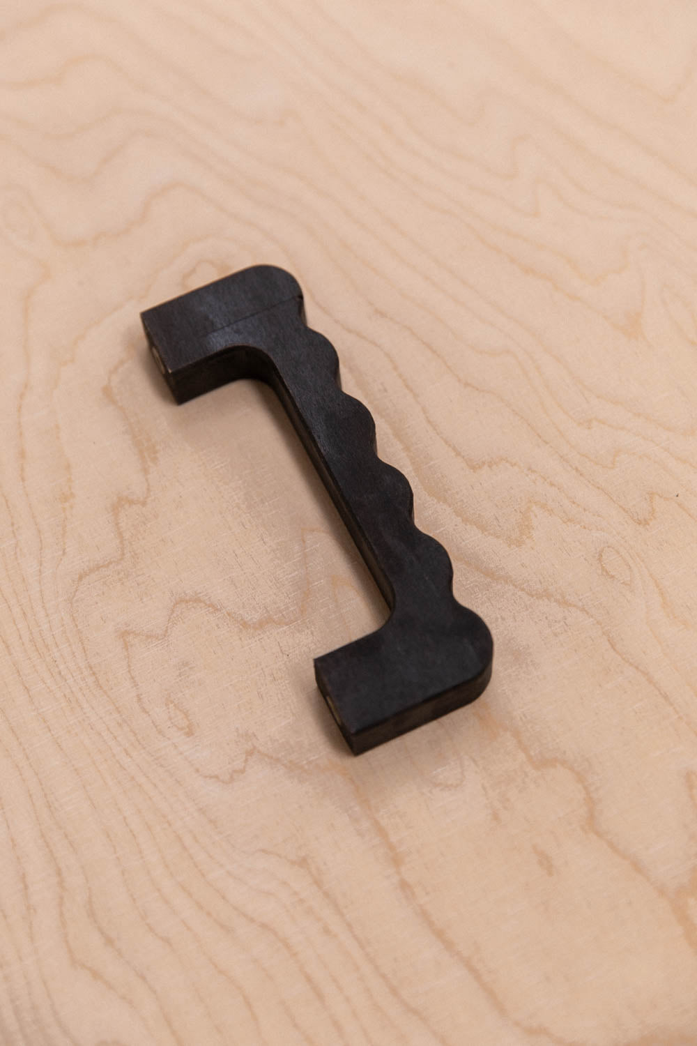 Poignée ondulée en hêtre