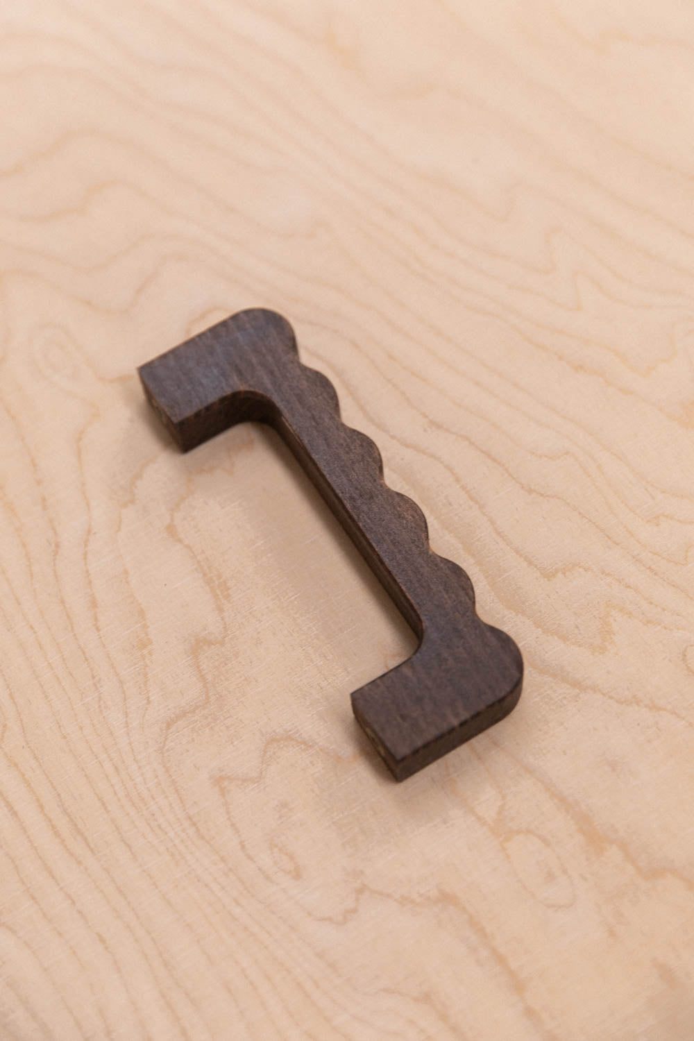 Poignée ondulée en hêtre