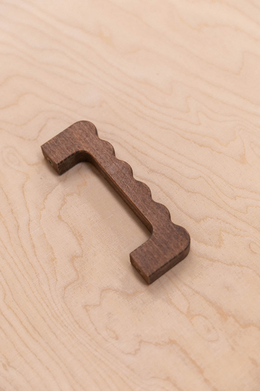 Poignée ondulée en hêtre