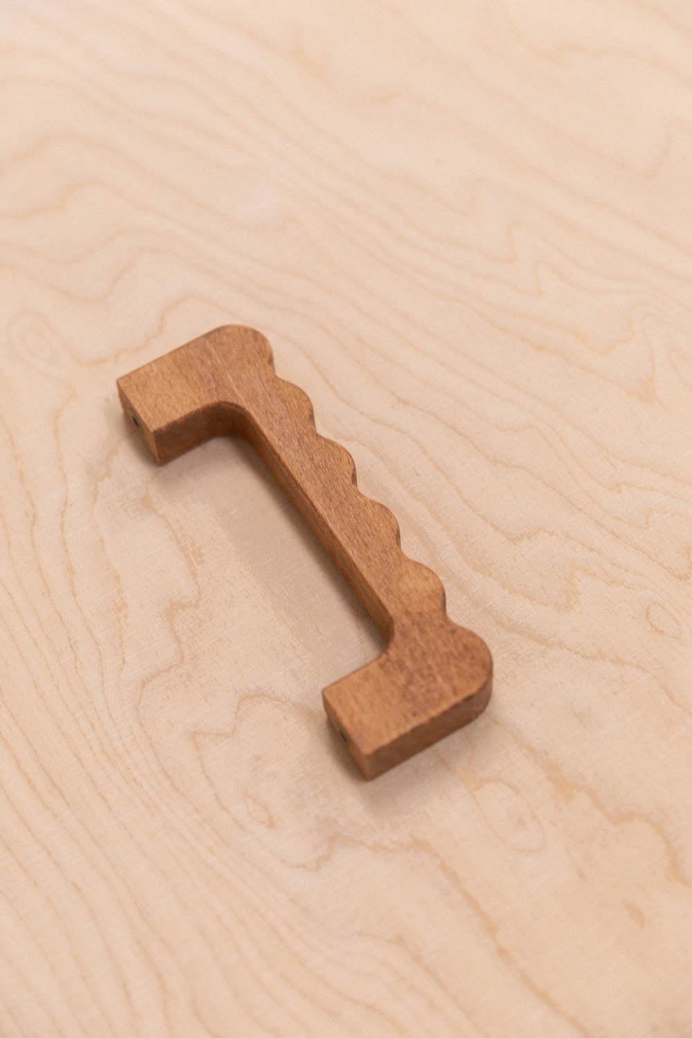 Poignée ondulée en hêtre