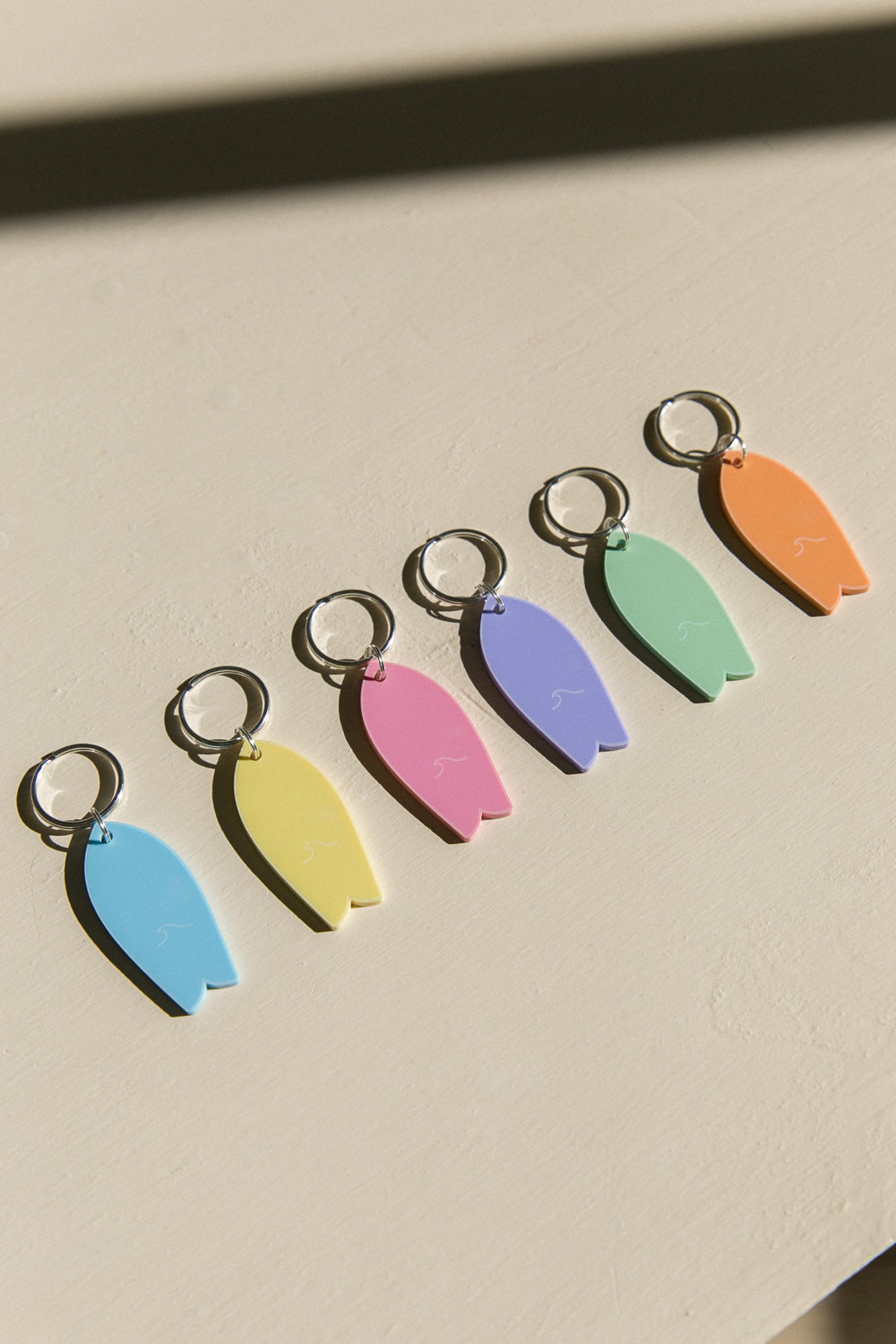 Porte-clés Surf motif vague Pastel