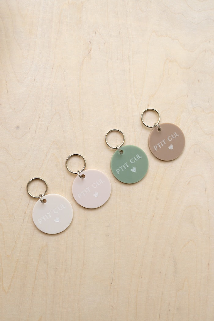 Porte-clés rond P'tit cul Tons neutres