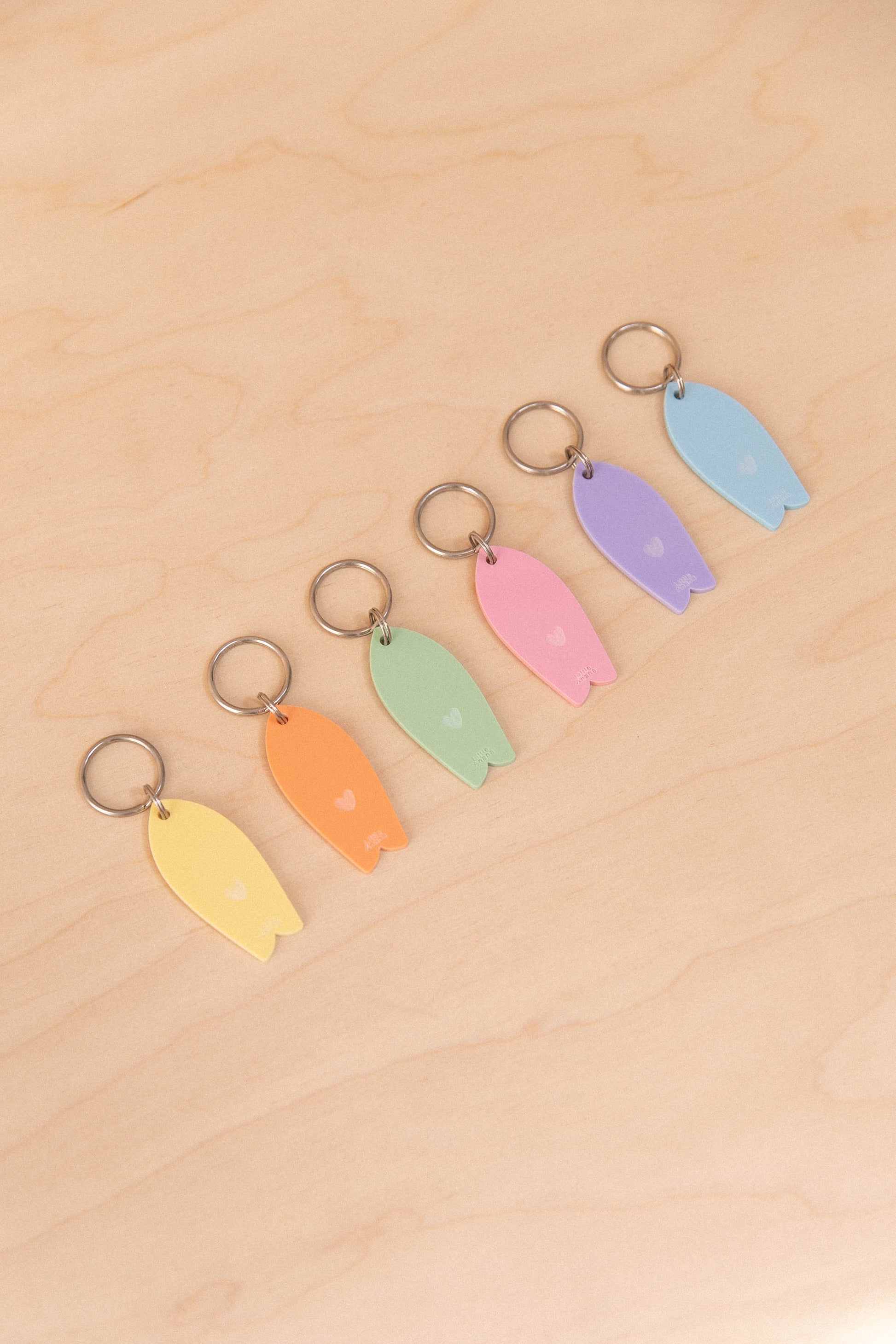 Porte-clés Surf motif coeur Pastel
