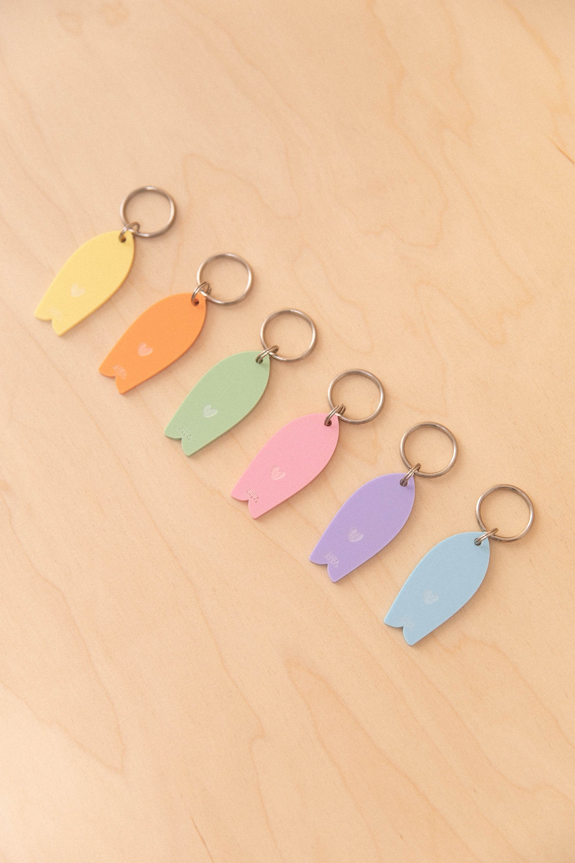 Porte-clés Surf motif coeur Pastel
