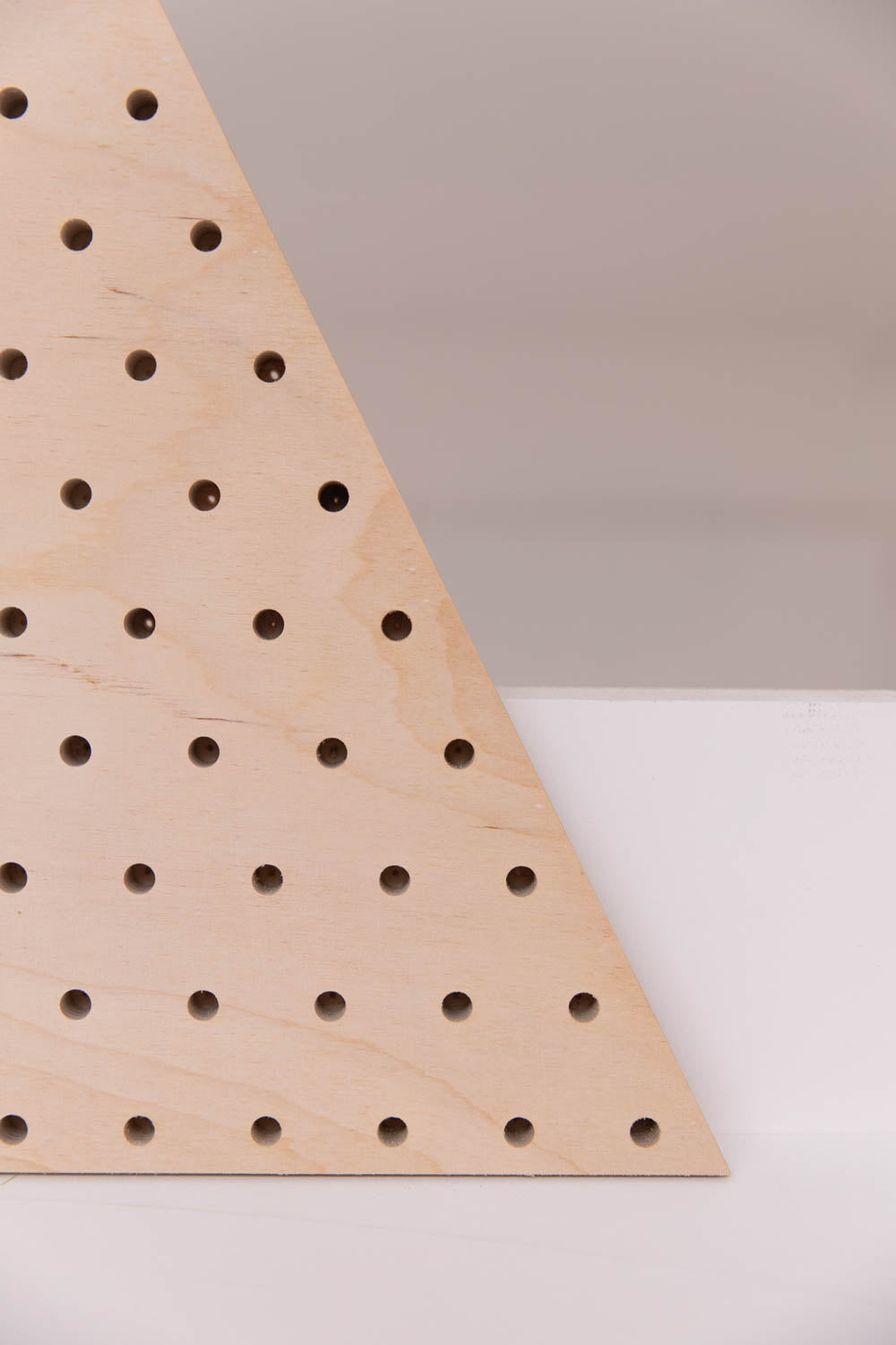Large imperfect triangle pegboard