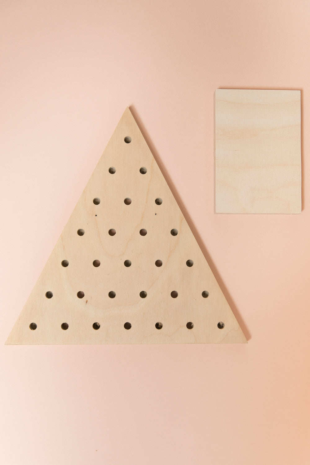 Small imperfect triangle pegboard