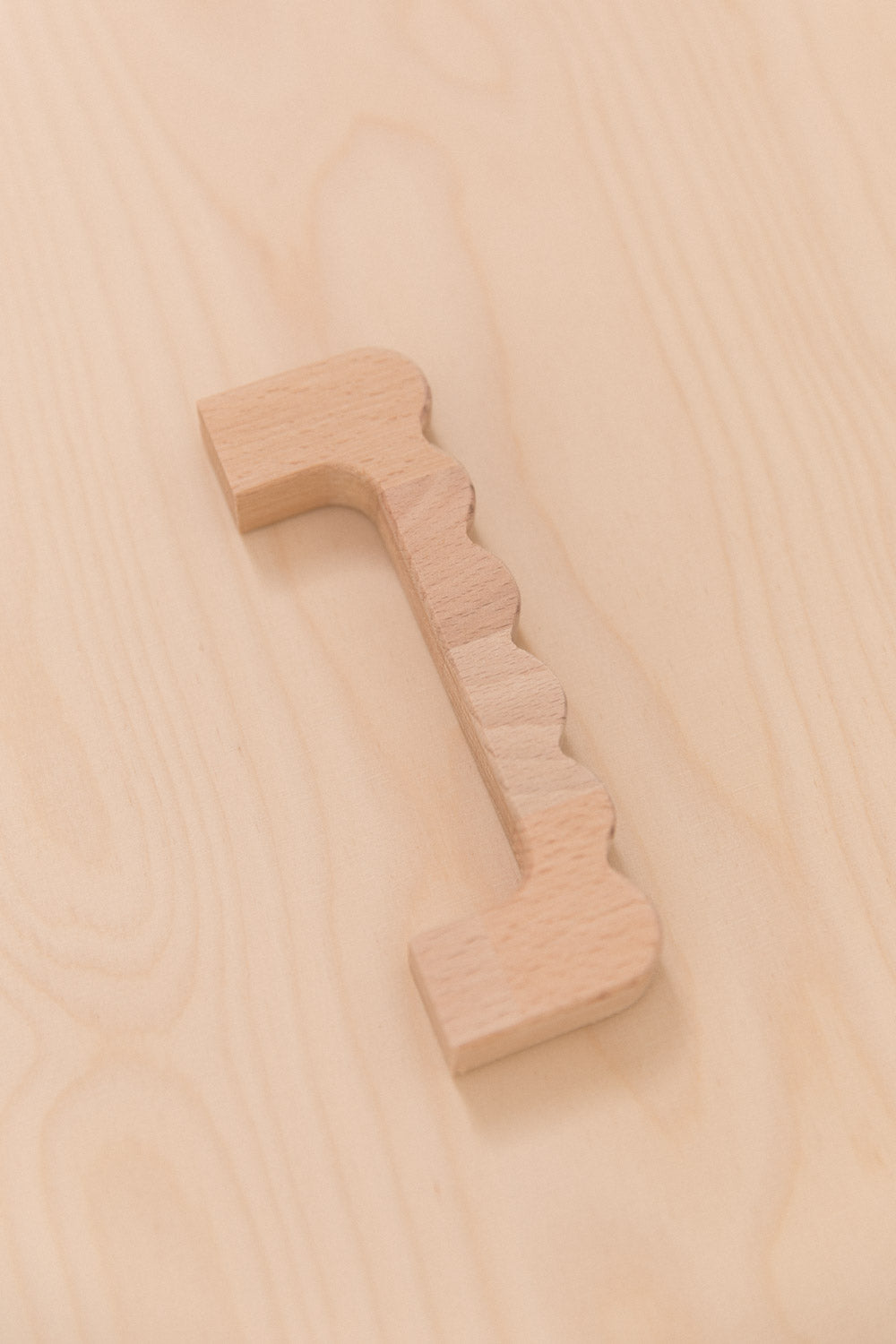 Poignée ondulée en hêtre